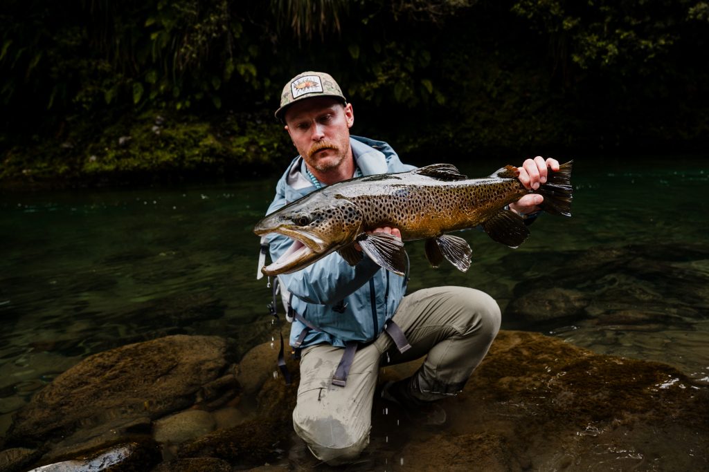 Fly Fisher In River